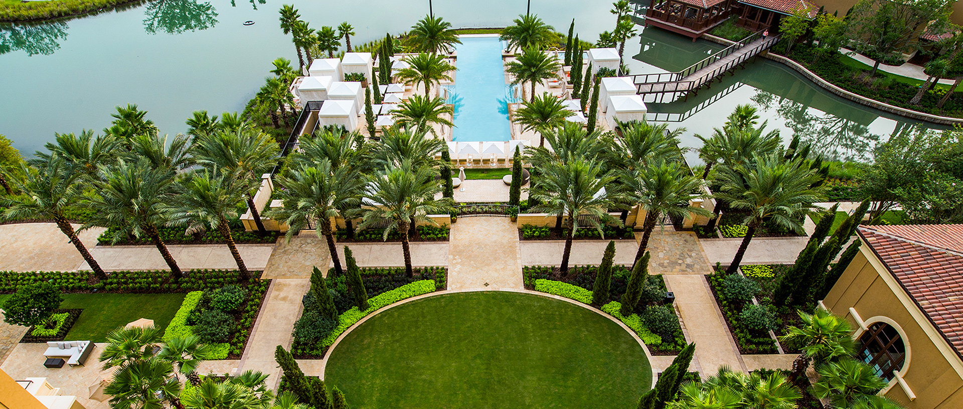 ©EDSA | Four Seasons Resort Orlando at Walt Disney World | Aerial View of Pool, Lake and Garden