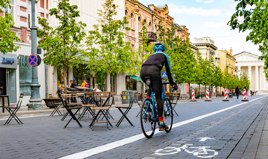 ©EDSA | Insights | Strides Towards Wellness | Man Biking in Closed Street