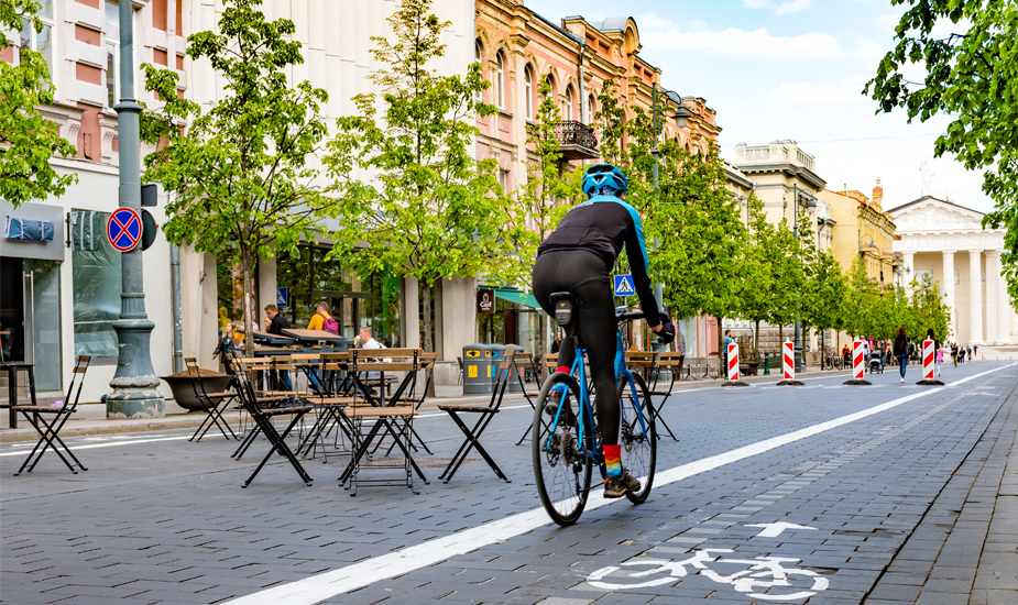 ©EDSA | Insights | Strides Towards Wellness | Man Biking in Closed Street 